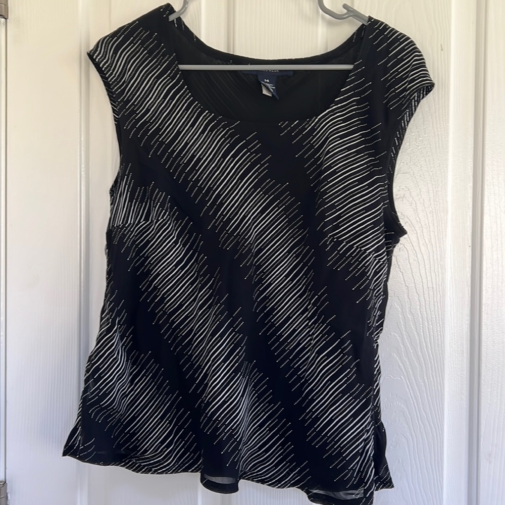 Woman’s black blouse